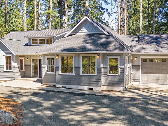 Exterior with attached 2-car garage