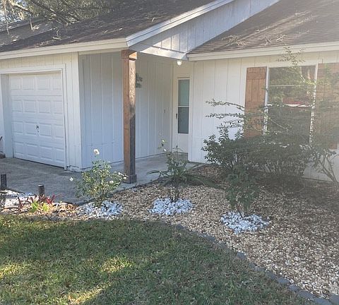 Entry accented by garden