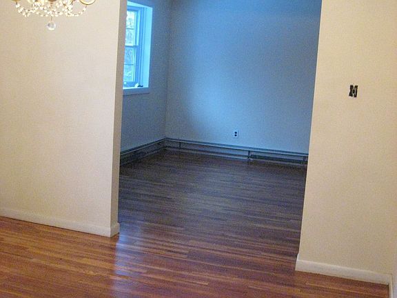 Dining room with newly refinished hardwood floors.