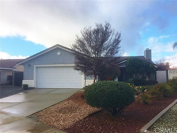 HOME IS SITUATED ON AN INSIDE LOT. LARGE DRIVEWAY and SIDE YARD ACCESS TO GATED RV PARKING PAD.