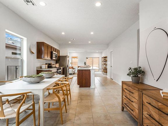 Cafe located just off the kitchen comfortably seats 6