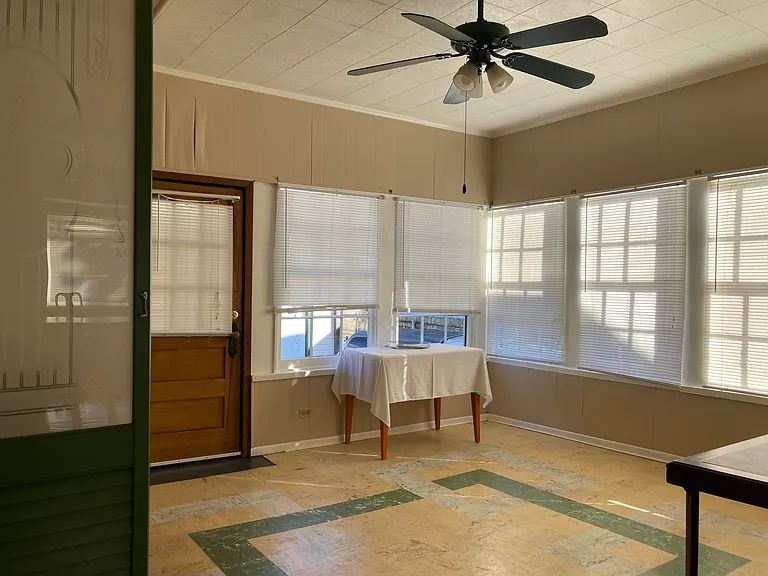 First floor bedroom/study. Back door.