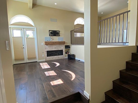 Living room with ground level patio (with french doors)