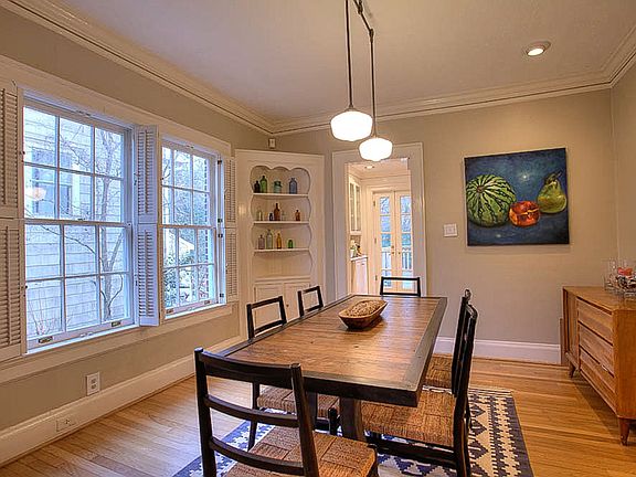 Extra-large dining room features original built-ins