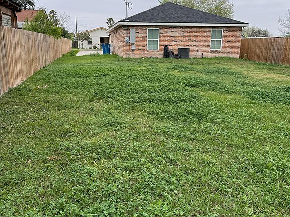 Backyard facing house