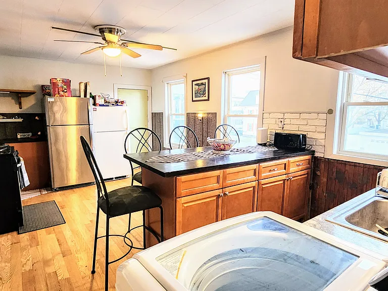 Large Shared Kitchen with Hardwood Floors