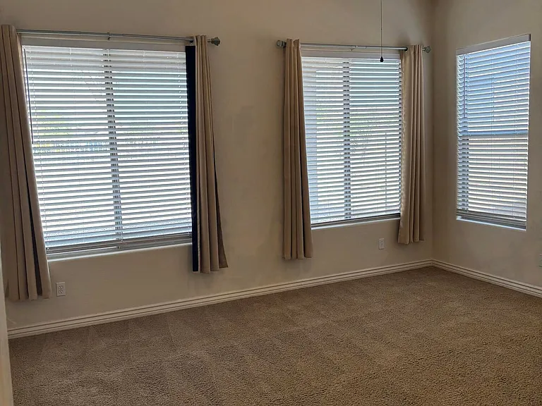 PRIMARY BEDROOM. CEILING FANS IN ALL BEDROOMS.