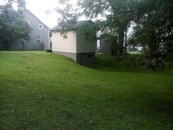 Root cellar tornado shelter