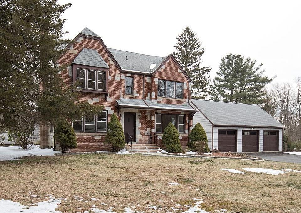 Welcome to 349 Amity Road with 3 car detached garage