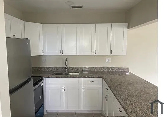207 NW 32nd Ct #211 — Photo 1