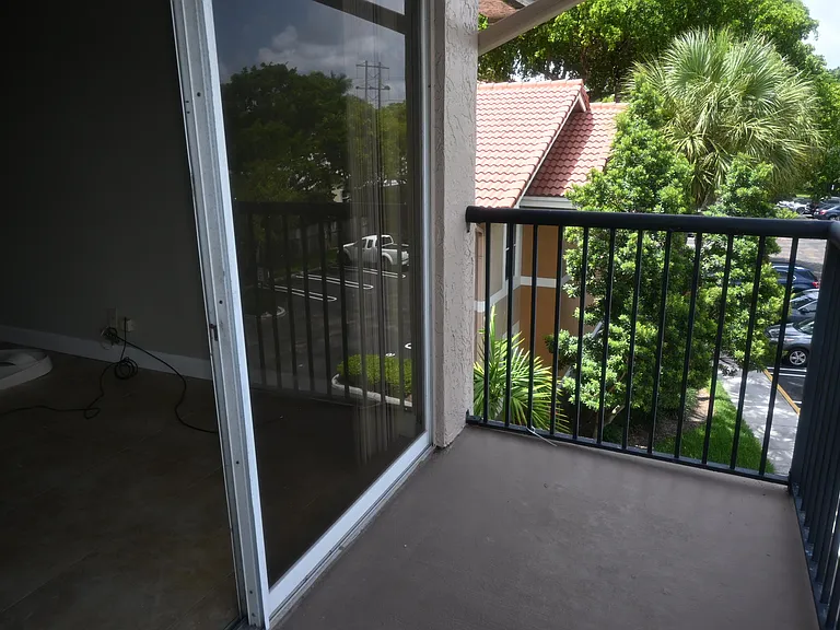 8721 Wiles Rd #305 — Photo 22