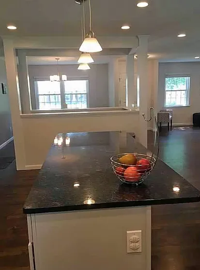 View from kitchen showing dining room and front door