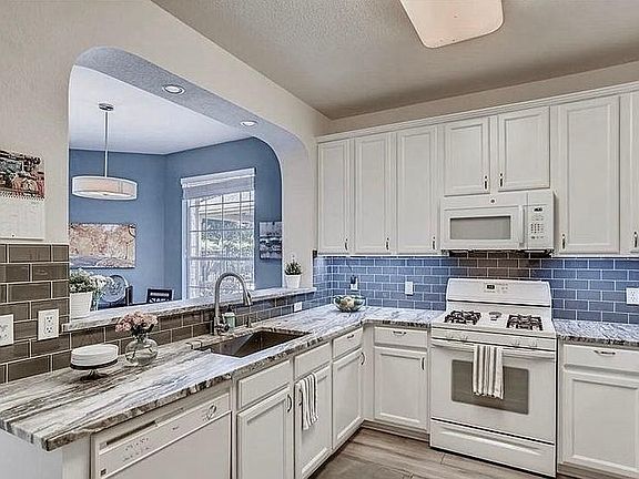Spacious Kitchen with arch.