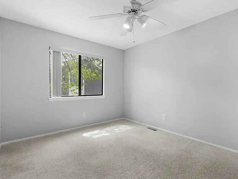 Two additional secondary bedrooms ideal for guests, a home office, or additional living space.