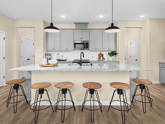 Kitchen with pendant lighting and spacious island