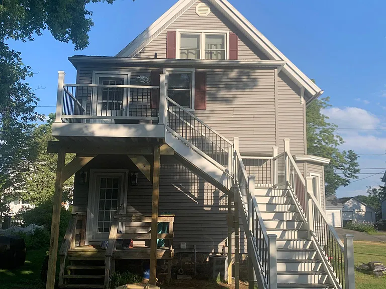 back stair case entrance with private deck, Newly built!