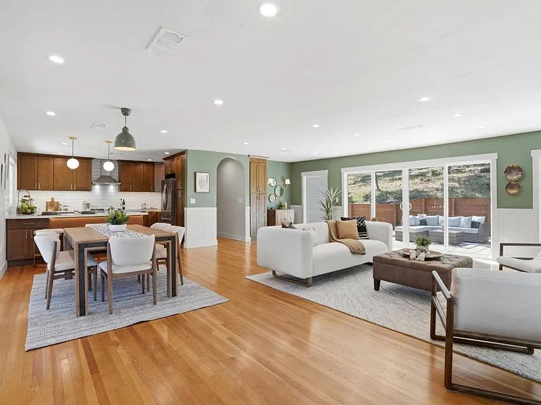 Flexible dining and gathering space with patio access
