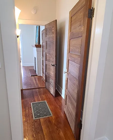 Hallway between dining room and queen bedroom. 
Bathroom is off the hallway.