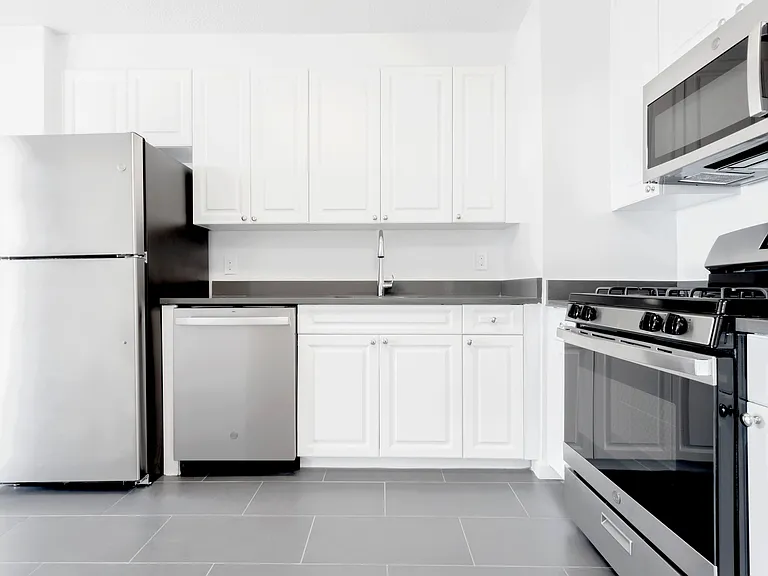 Elevate your lifestyle at The Century, where modern design meets functionality in our sleek kitchen equipped with stainless steel appliances. Enjoy the spacious layout and sophisticated finishes. Schedule your tour today!