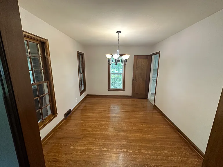 Dining room, original wood flooring.