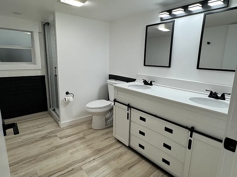 Large bathroom with double sinks