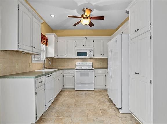 5th image of 11712 E 21st Street Ct S