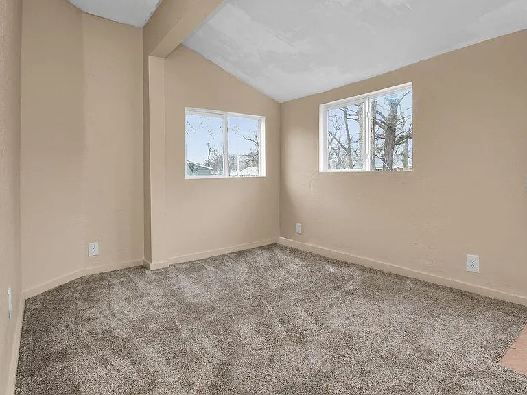 Flex room that could be a third bedroom or office. the door to the right leads to the back yard. Closet is to the right.