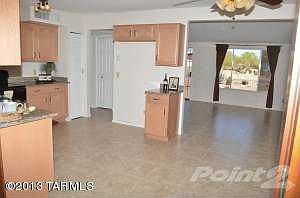 Kitchen looking into Family Room