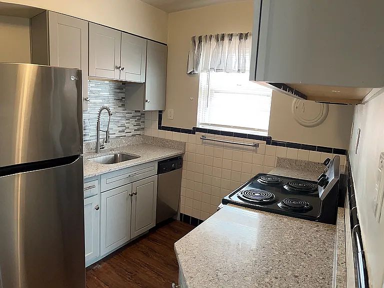 New Kitchen, Granite, Stainless, Dishwasher, Microwave, Range, Disposal, Fridge, Five electric outlets, under cabinet lighting, lots of cabinets and pantry closet