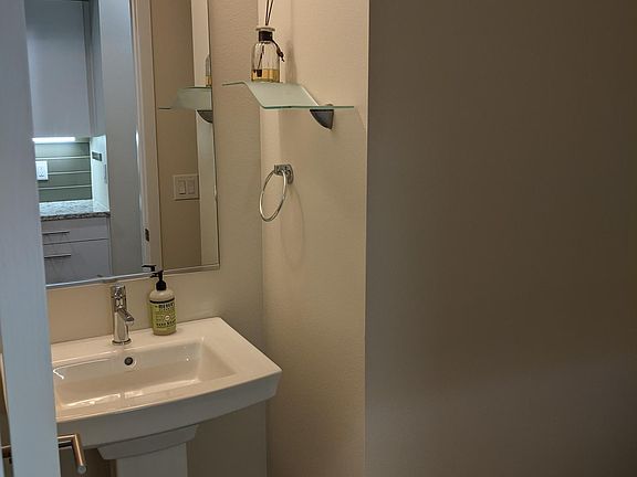 Half bath accessed from the kitchen