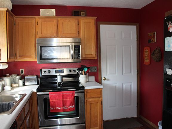 Kitchen with access to garage and laundry/pantry