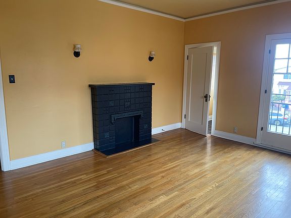 Living room with decorative fireplace
