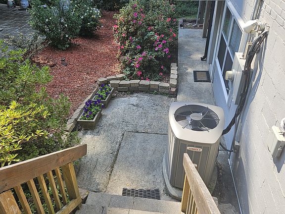 Park at the top of these steps; well lit with motion-detecting lights on pathway to your door.