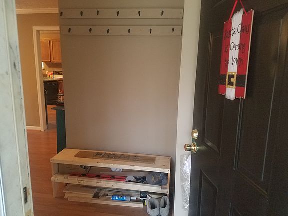 FRONT ENTRY WITH COAT AND RACK