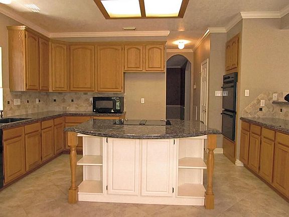 Large Island Kitchen with Granite Counter Tops. You will have room for several helpers.