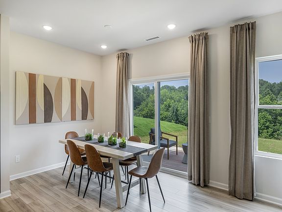 Dining area in the Chatham floorplan at a Meritage Homes community in Haw River, NC.