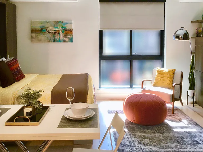 The convenient studio-style homes offer built-in Murphy beds and shelving to maximize your space