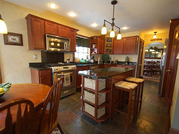 Kitchen-updated, slate tile floor, cherry cabinets, recessed lights