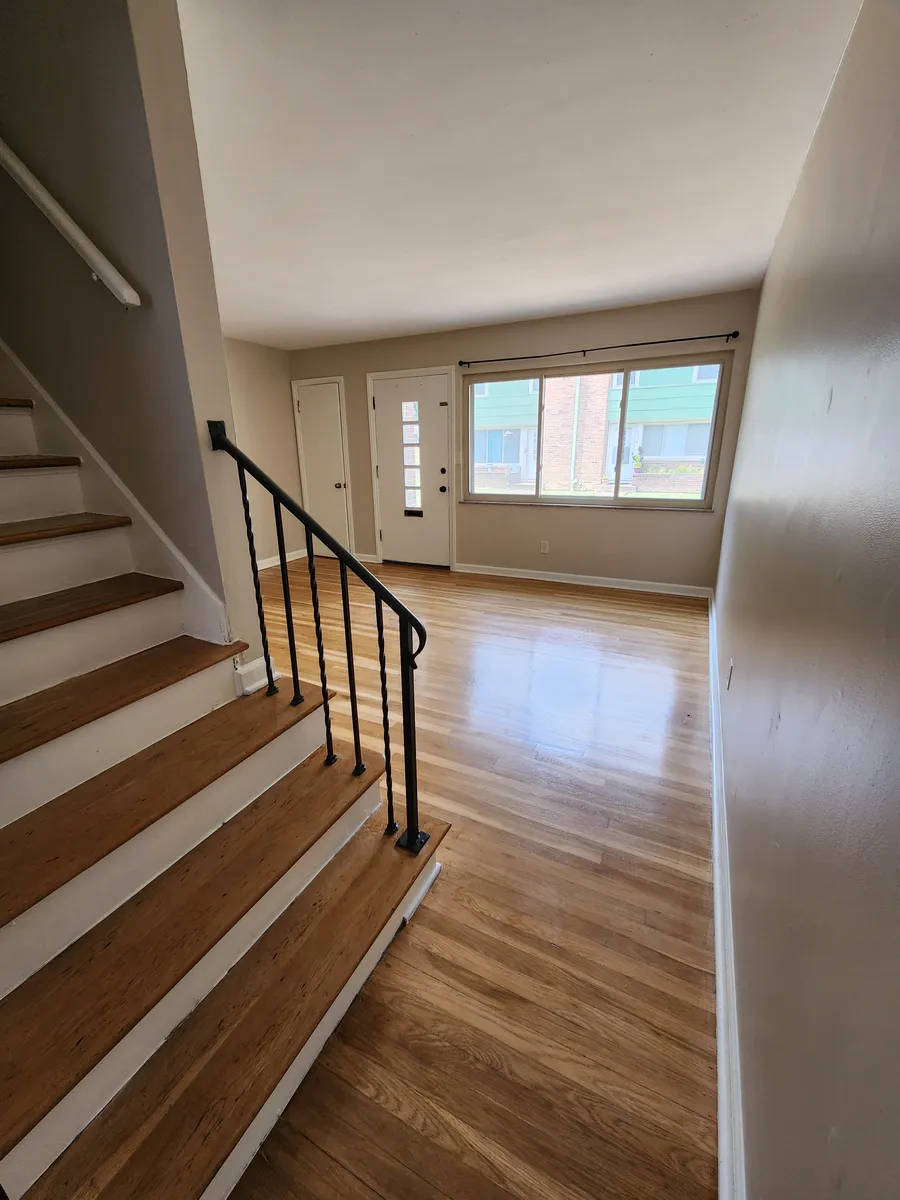 Bottom of stairs to family room - 986-992 Hilo Ln #988