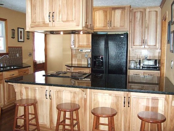 New custom kitchen- granite countertops,Brazilian Chestnut hardwood floors