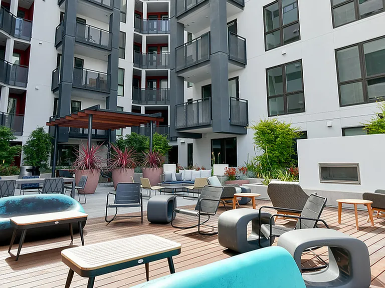 Stunning outdoor terrace with lounge seating and outdoor kitchen