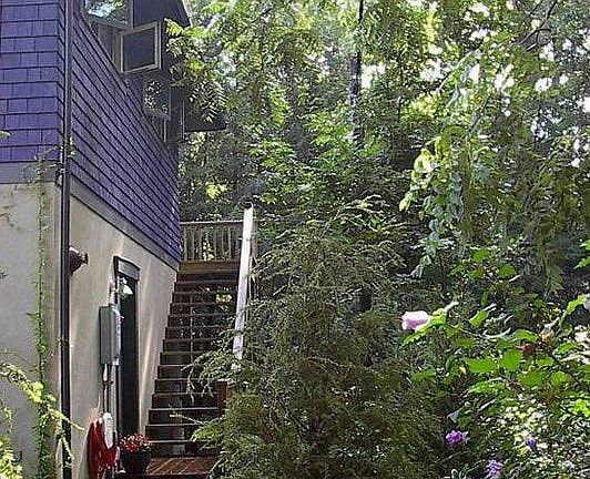 Stairs to the cottage. The gorund floor is the owner's offic