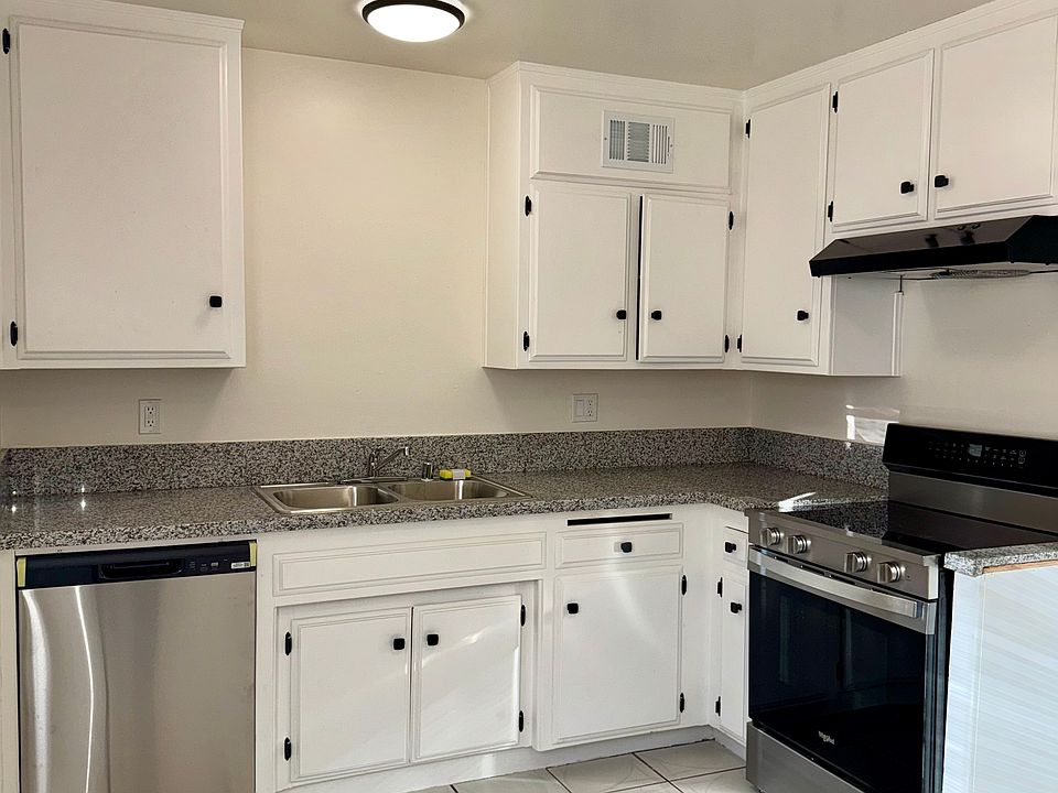 Brand New Kitchen with Stainless Steel Stove & Dishwasher, lots of cabinetry with new door knobs, new stainless steel double sink/water fixtures