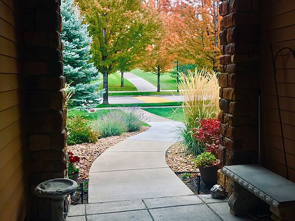 Taken from front door in autumn, bench included-leading to park on the other side of street. No homes in front of property!