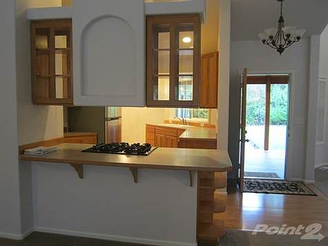 Entryway & kitchen from living room