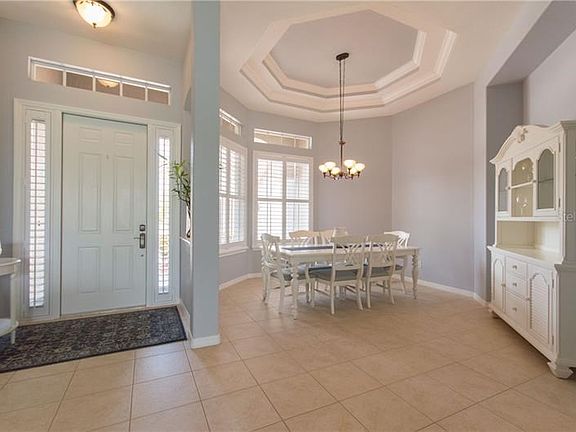 Plenty of light in the entry and dining room.