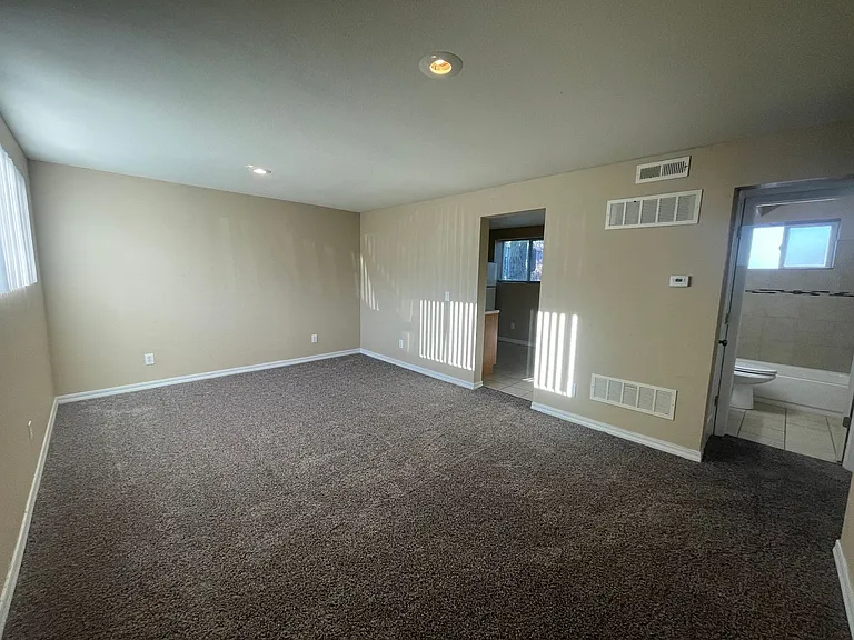 2BD Garden-Level Home | Off-Street Parking — Photo 9