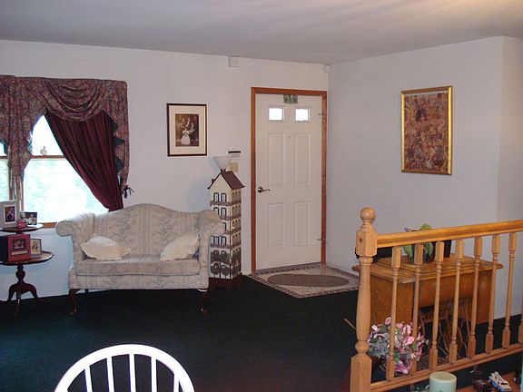 Living room with tile entry way