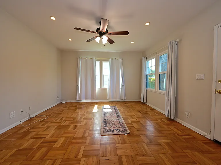 fully upgraded and bright w/ parquet hardwood flooring + mini split hvac + in-unit laundry