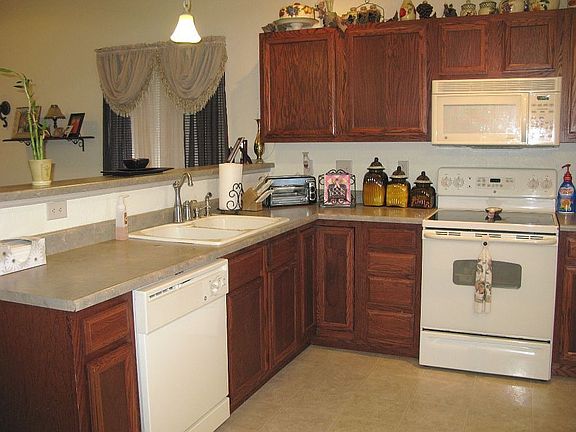 Kitchen includes all appliances, upgraded extra-deep double sink, and pantry